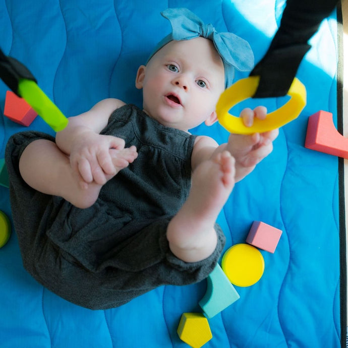 How to Get Your Baby Rolling with the Lay and Play Adventure Mat